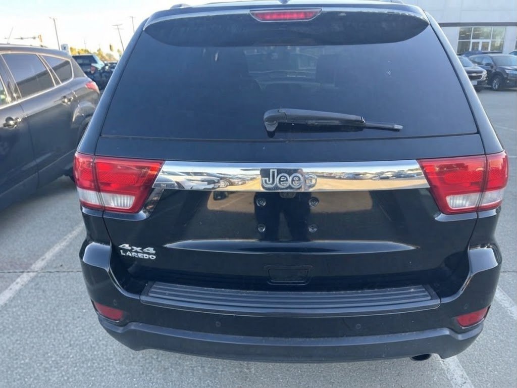Used 2012 Black Forest Green Pearlcoat Jeep Laredo image 3
