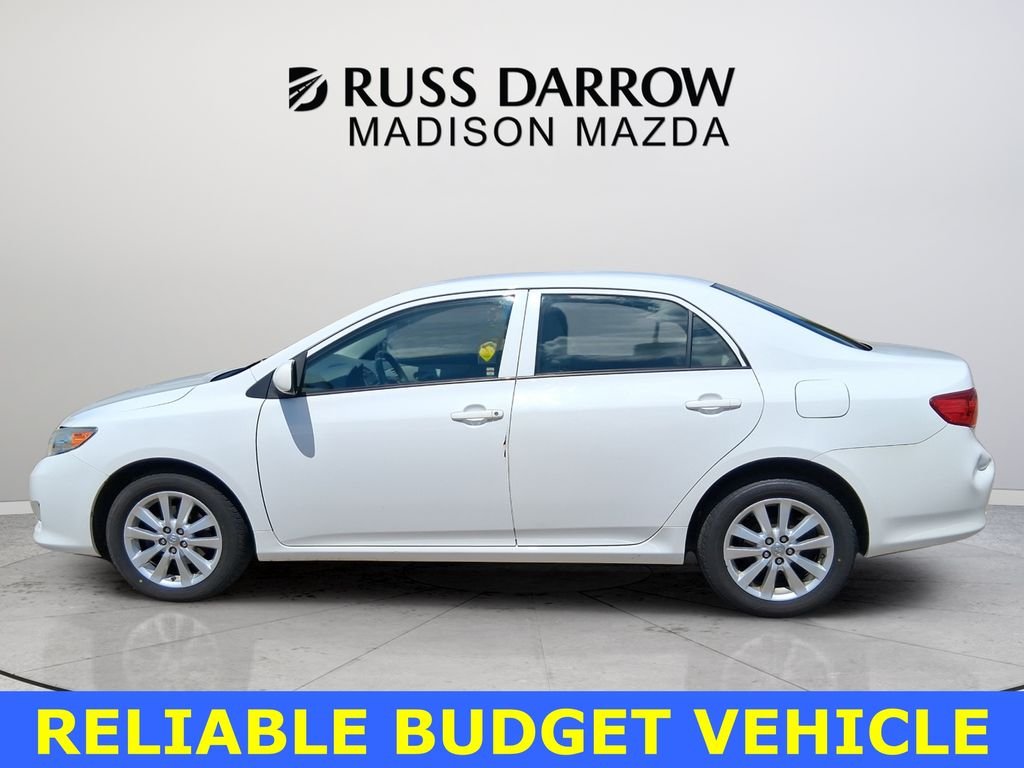Used 2009 Toyota Corolla Base with VIN JTDBL40EX99047192 for sale in Madison, WI