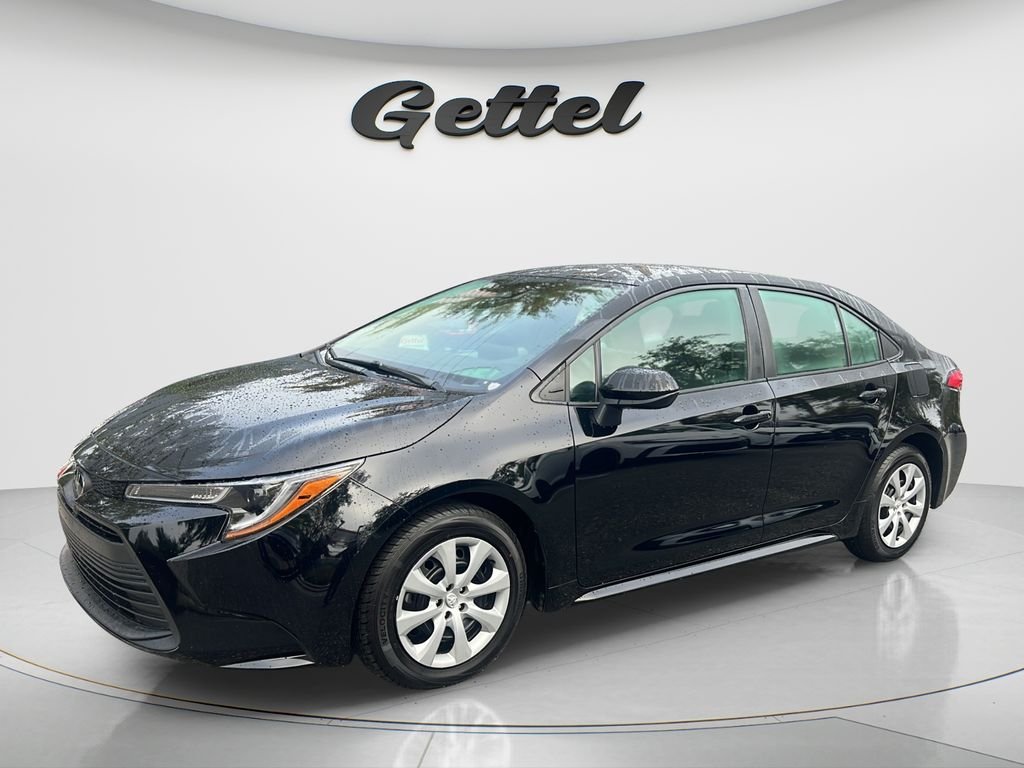 Used 2024 Black Toyota LE image 1