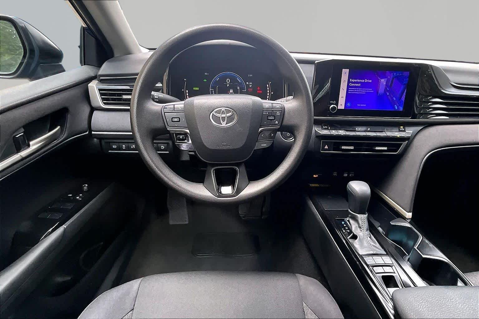 Used 2025 Reservoir Blue Toyota LE image 6