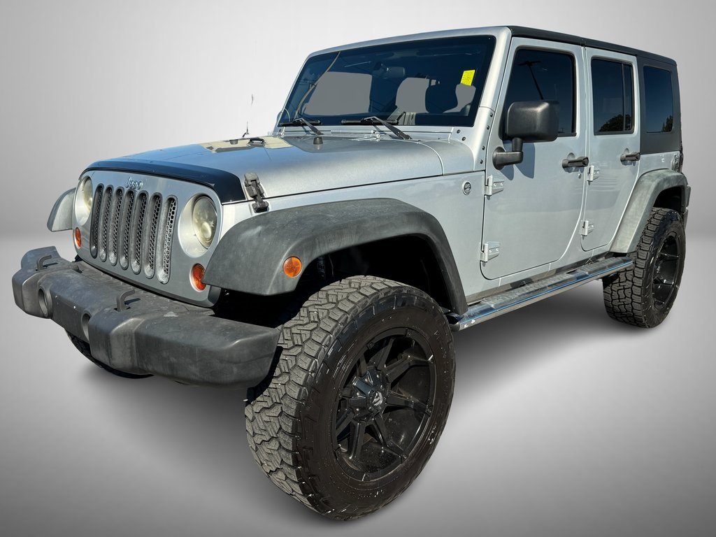 Used 2011 Jeep Wrangler Unlimited Sport with VIN 1J4BA3H14BL519049 for sale in Albertville, AL