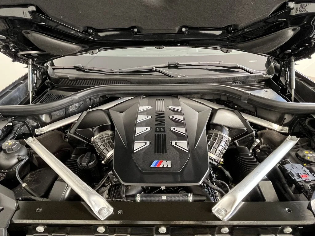 Certified Used 2025 Black Sapphire Metallic BMW M60i image 13