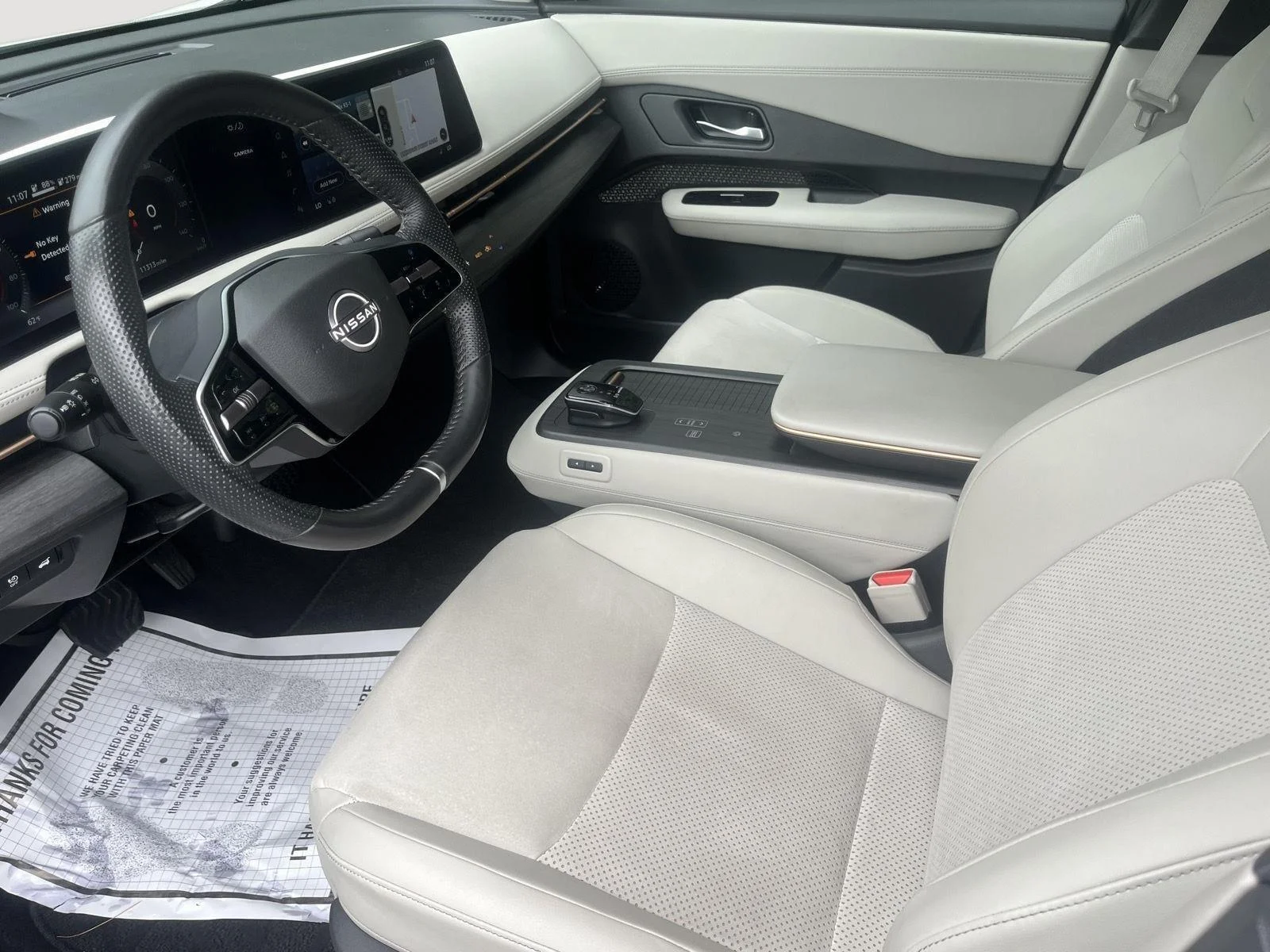Used 2025 Everest White Pearl Tricoat/Black Diamond Pearl Nissan EVOLVE+ image 22