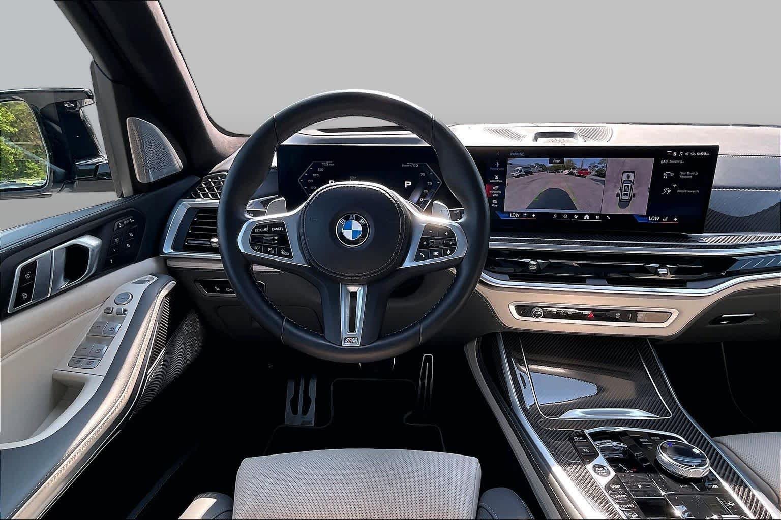 Certified Used 2024 Mineral White Metallic BMW M60i image 5