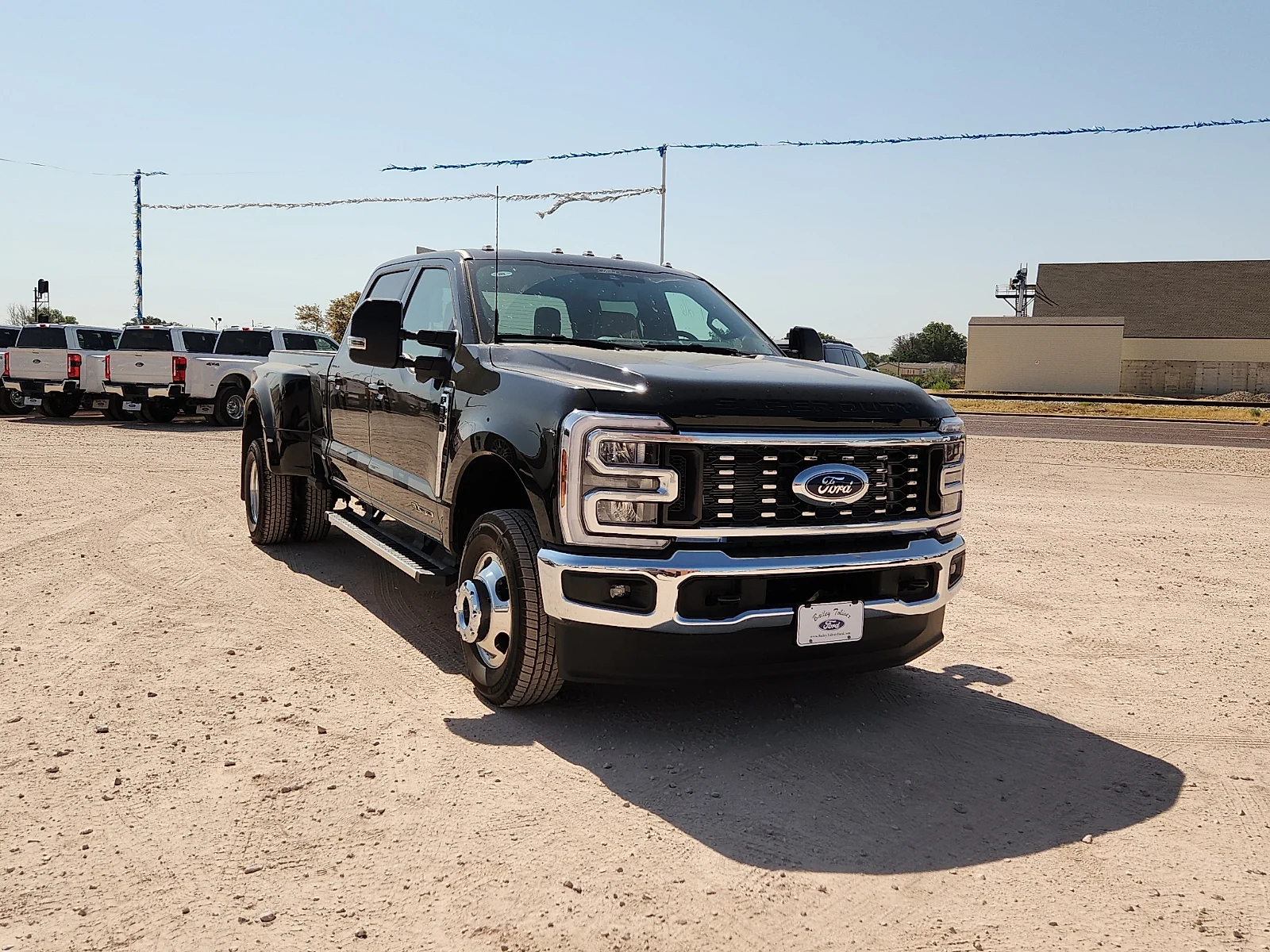 New 2026 Black Metallic Ford Lariat image 1