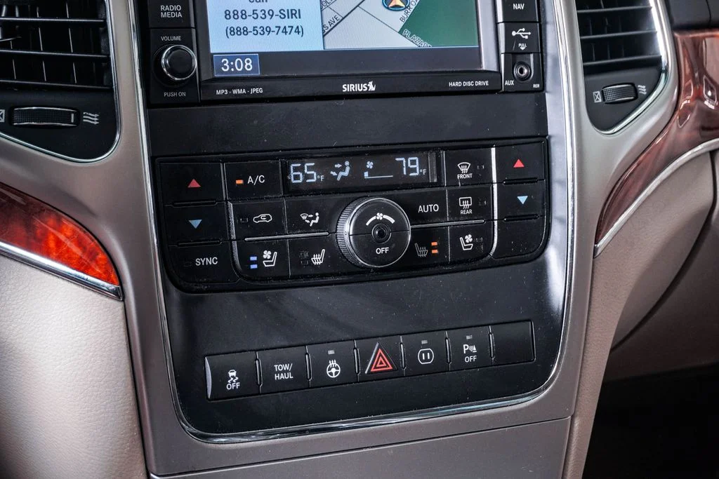 Used 2011 Bright Silver Metallic Jeep Overland image 24
