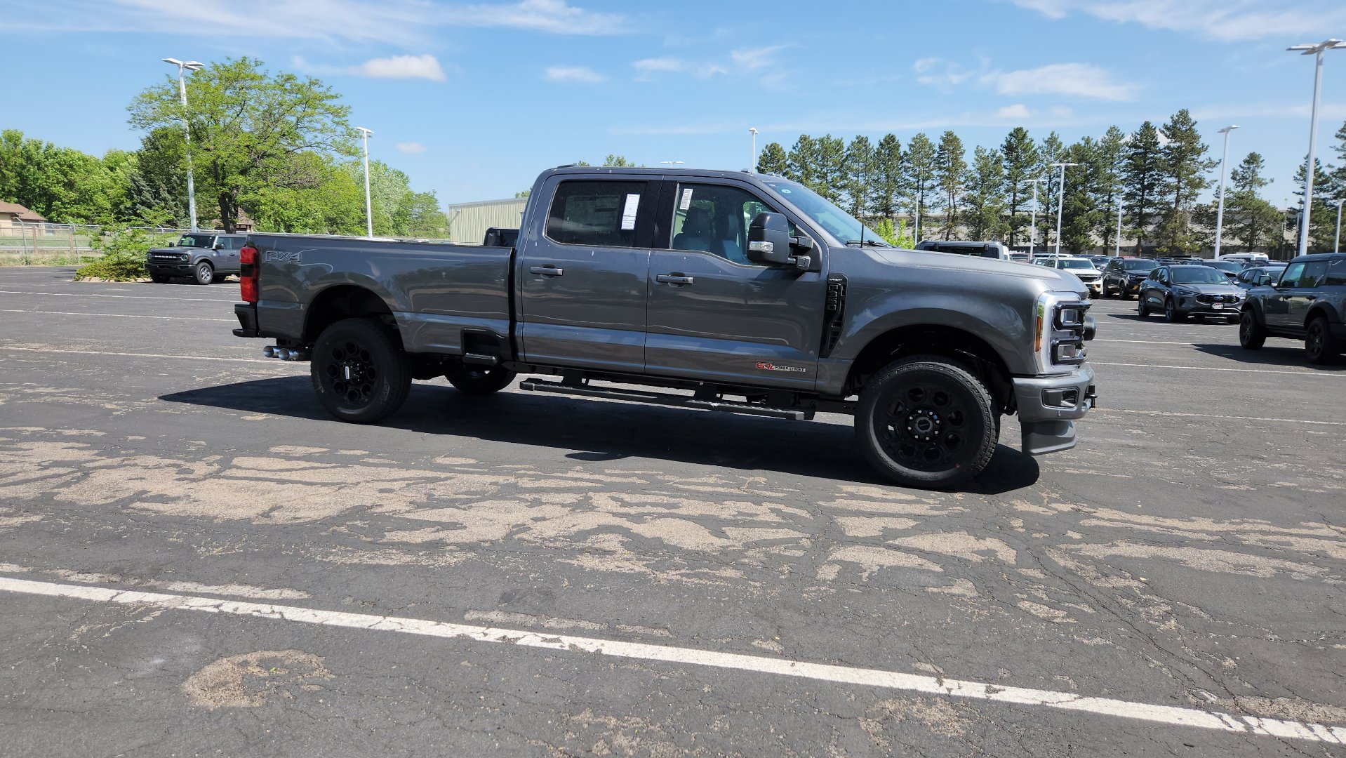 New 2026 Carbonized Gray Metallic Ford LARIAT image 19