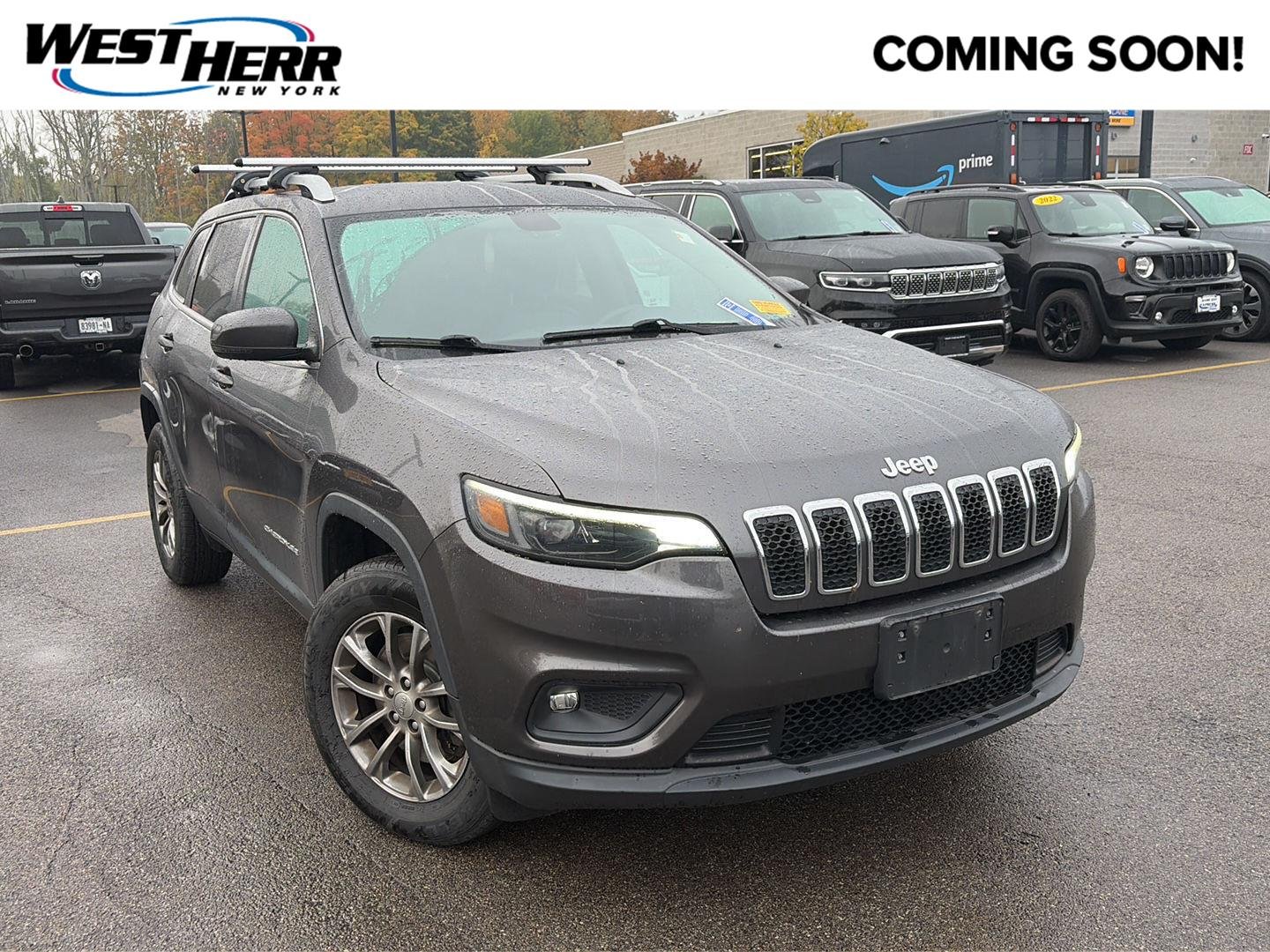 Used 2019 Granite Crystal Metallic Clearcoat Jeep Latitude Plus image 1