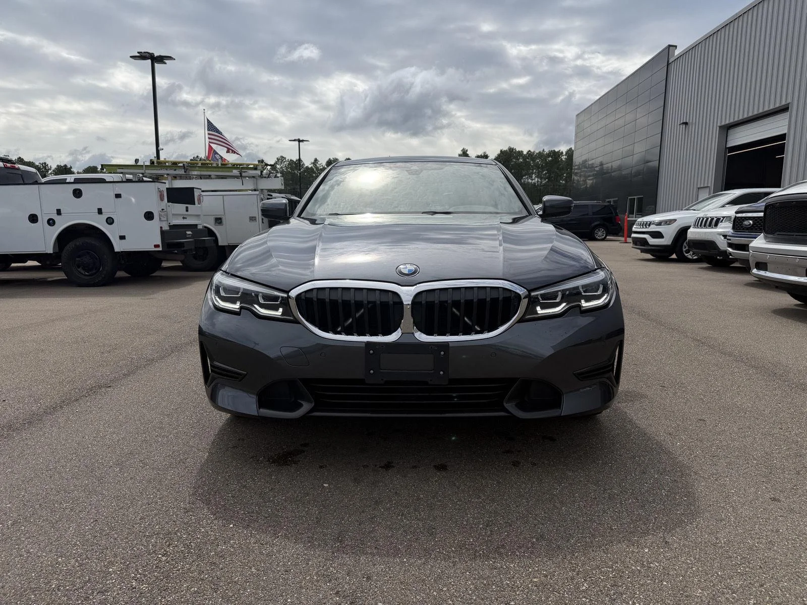Used 2022 Mineral Grey Metallic BMW 330i xDrive image 2