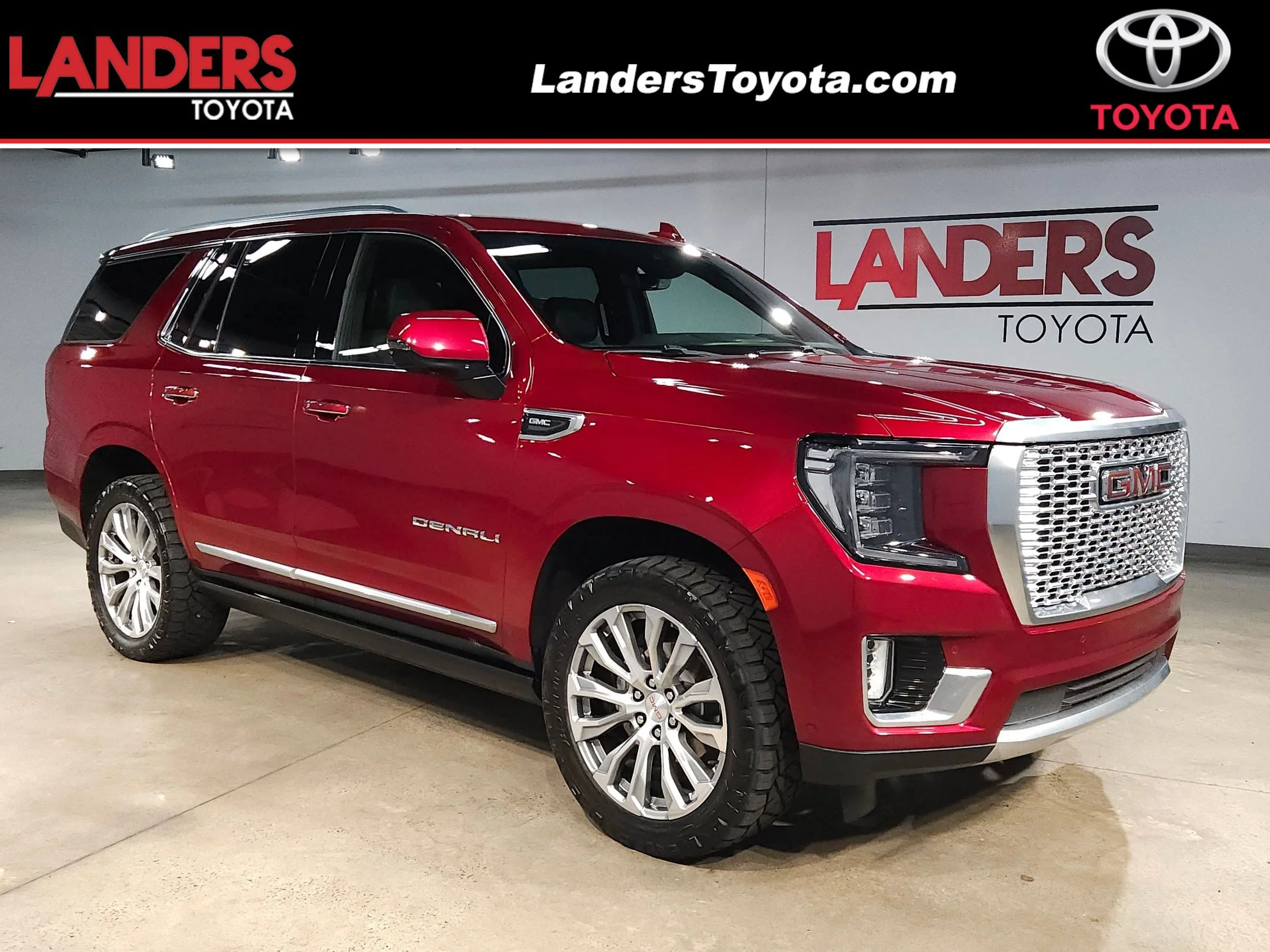 Used 2023 Volcanic Red Tintcoat GMC Denali image 1