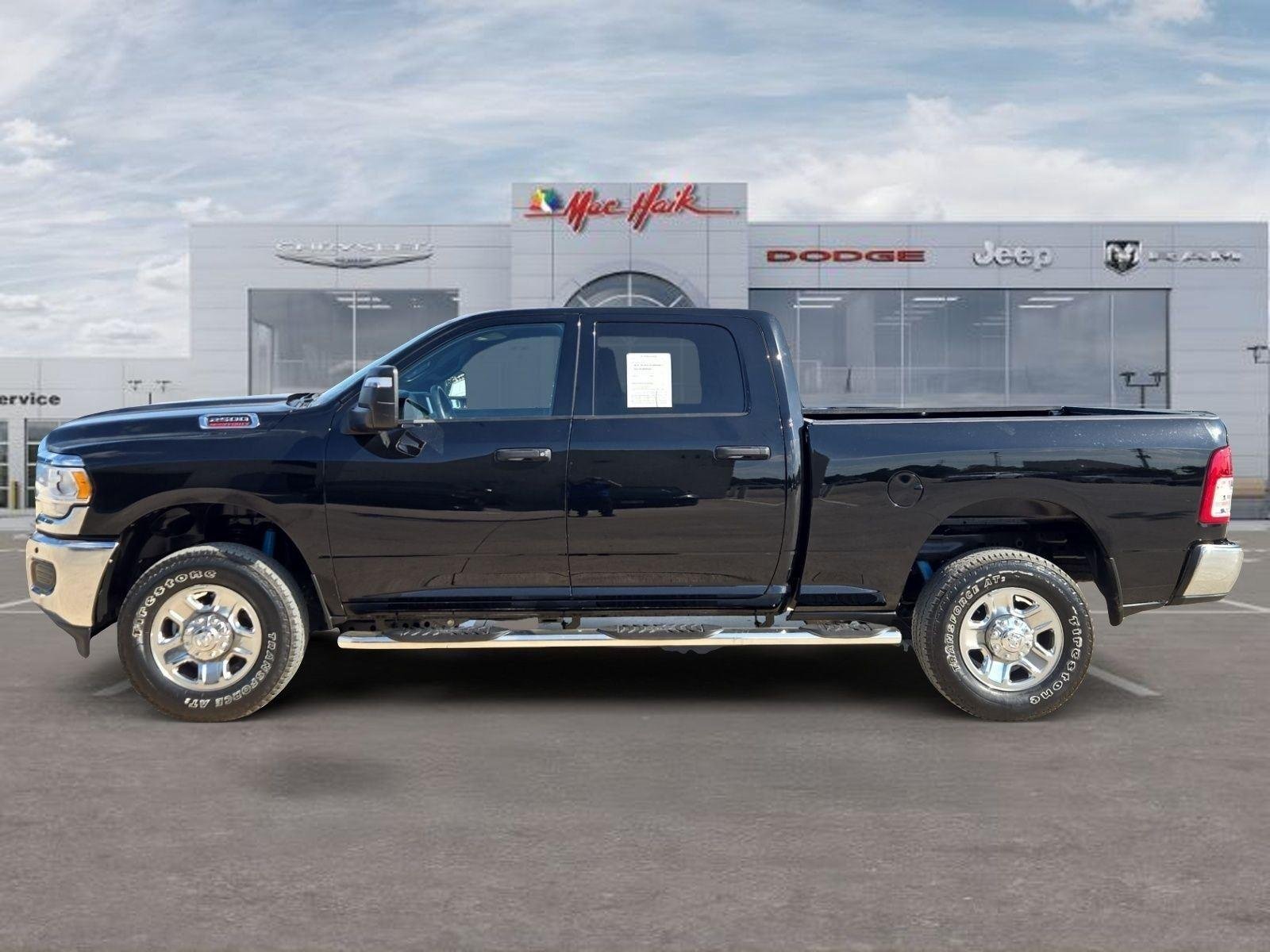 Used 2024 Diamond Black Crystal Pearlcoat Ram Tradesman image 2