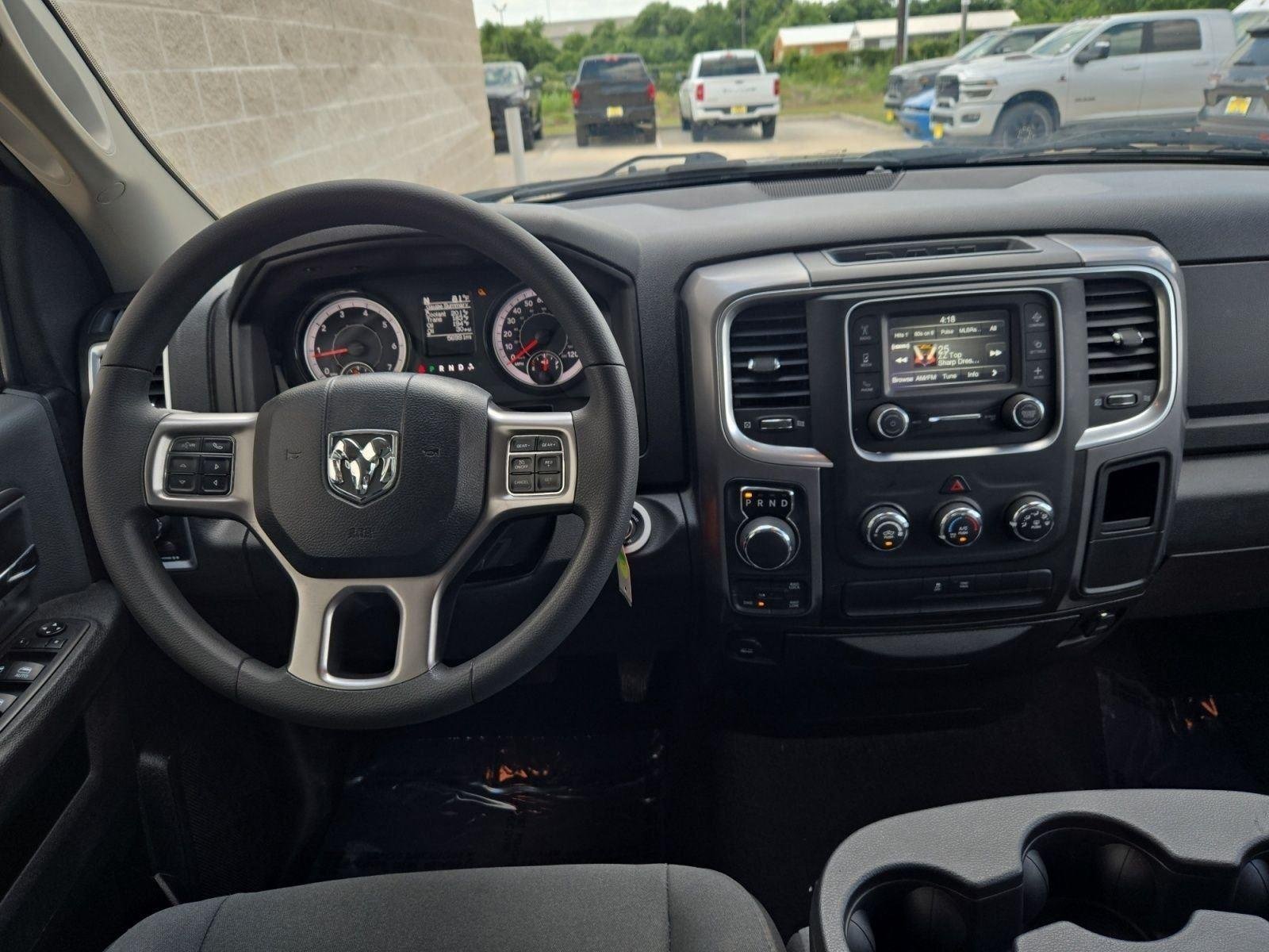 Used 2024 Diamond Black Crystal Pearlcoat Ram SLT image 16