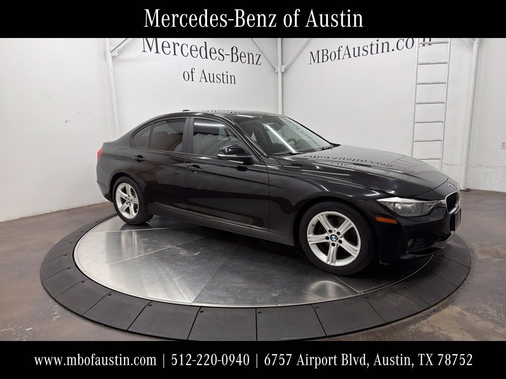 Used 2015 Black BMW 328i image 1