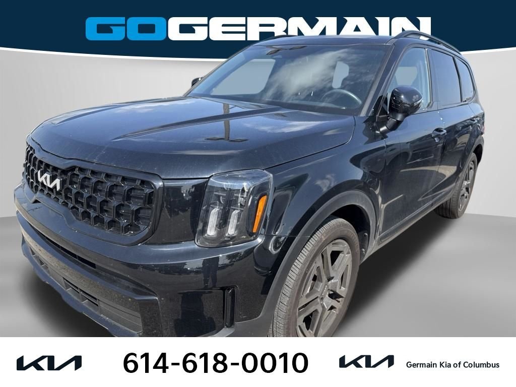 Used 2024 Black Kia EX X-Line image 1