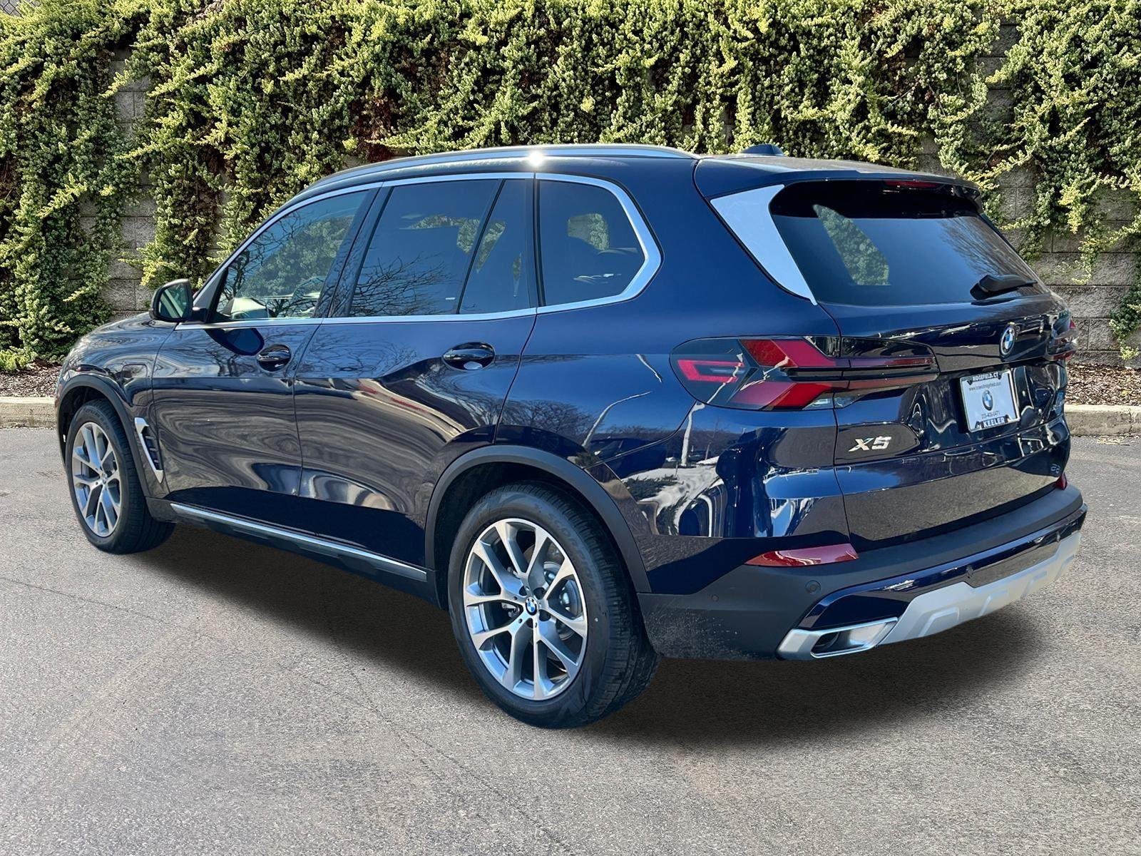 New 2026 Tanzanite Blue II Metallic BMW xDrive50e image 4