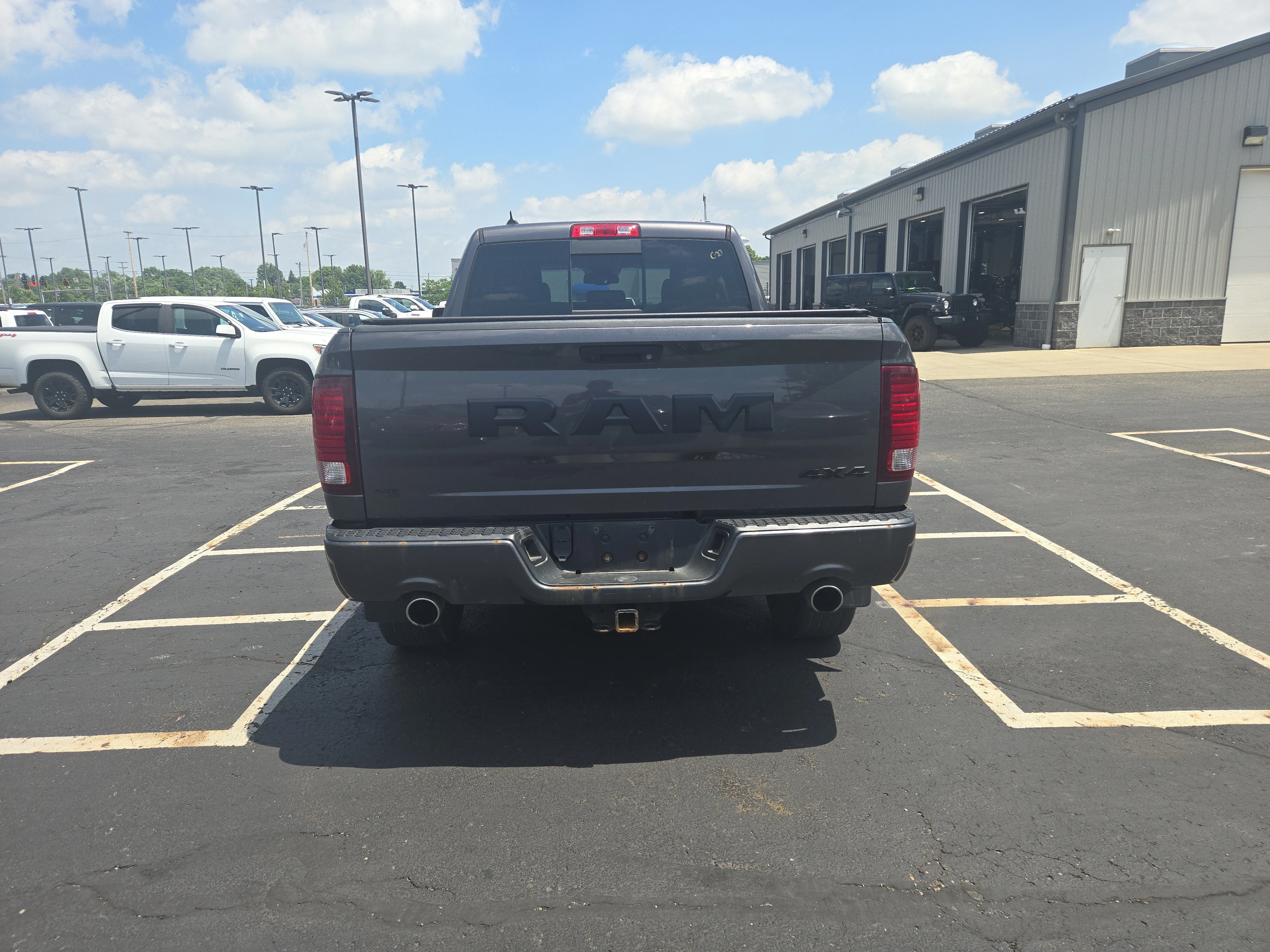 Used 2017 Granite Crystal Metallic Clearcoat Ram Night image 6