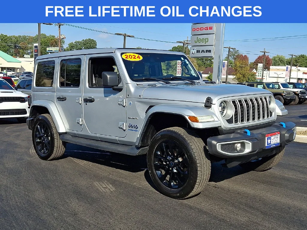 Used 2024 Silver Jeep Sahara 4xe image 1