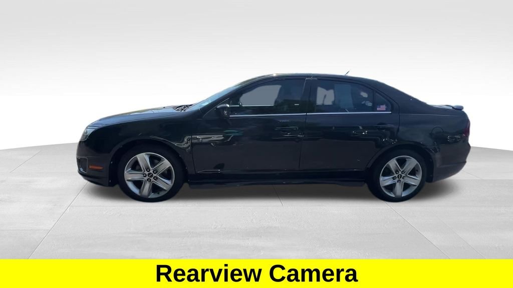 Used 2011 Tuxedo Black Metallic Ford Sport image 4