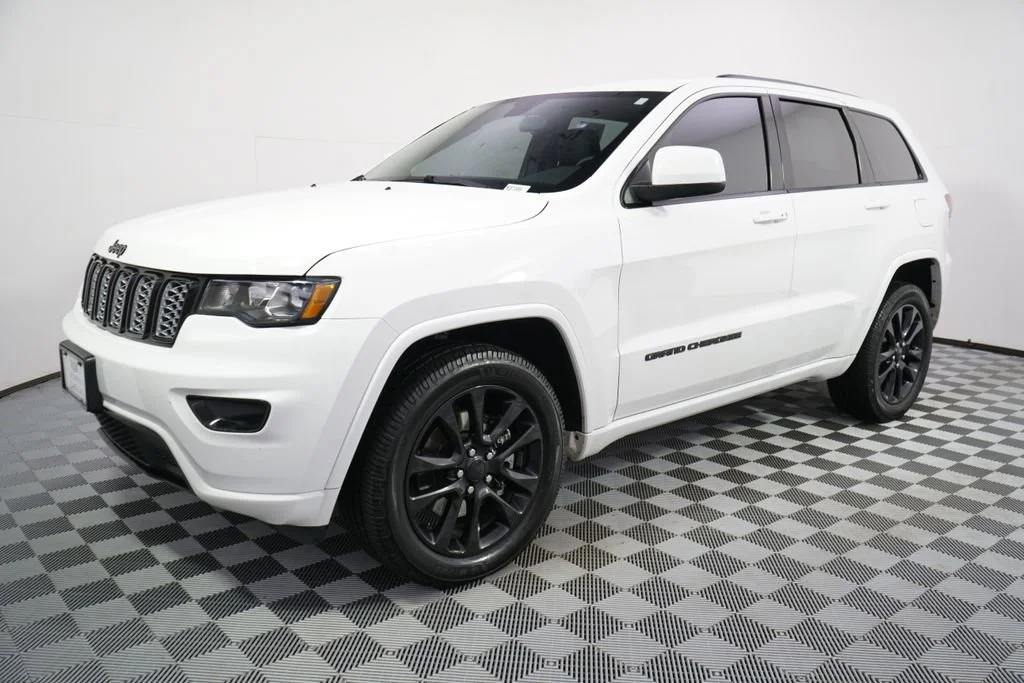 Used 2021 Jeep Grand Cherokee Laredo X with VIN 1C4RJFAG0MC873559 for sale in Minneapolis, Minnesota