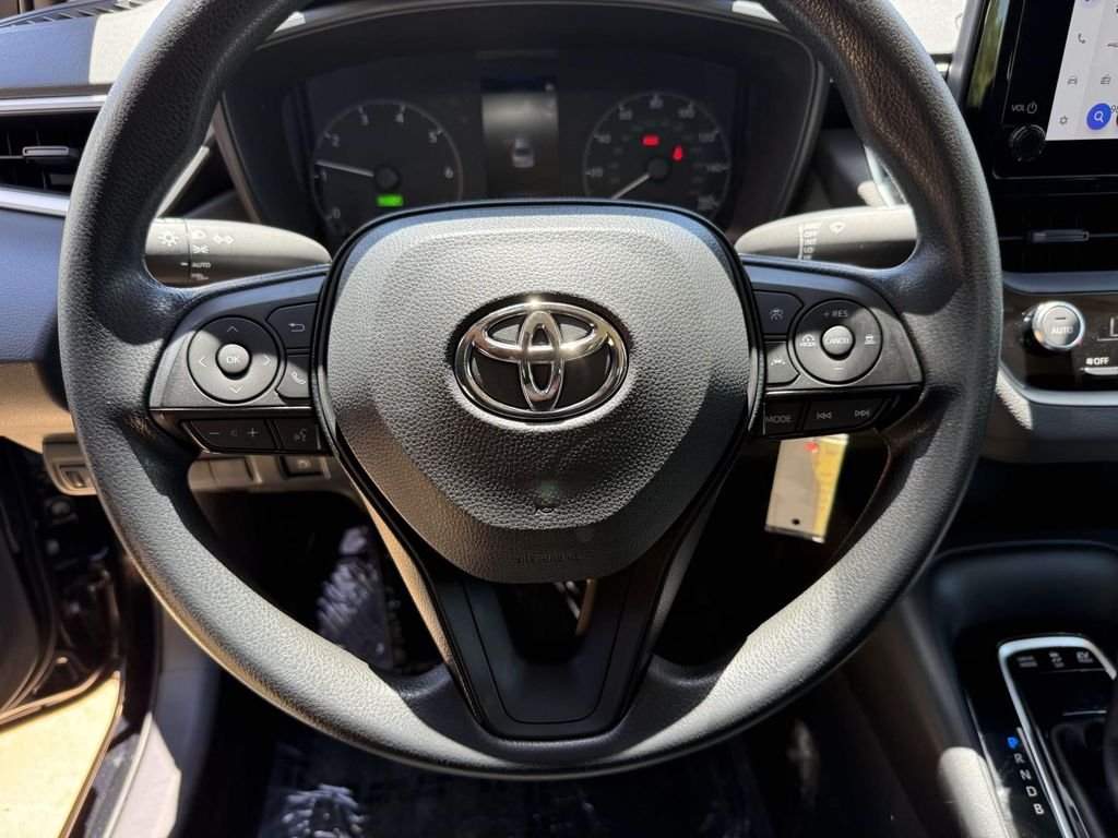 Used 2024 Black Toyota LE image 19