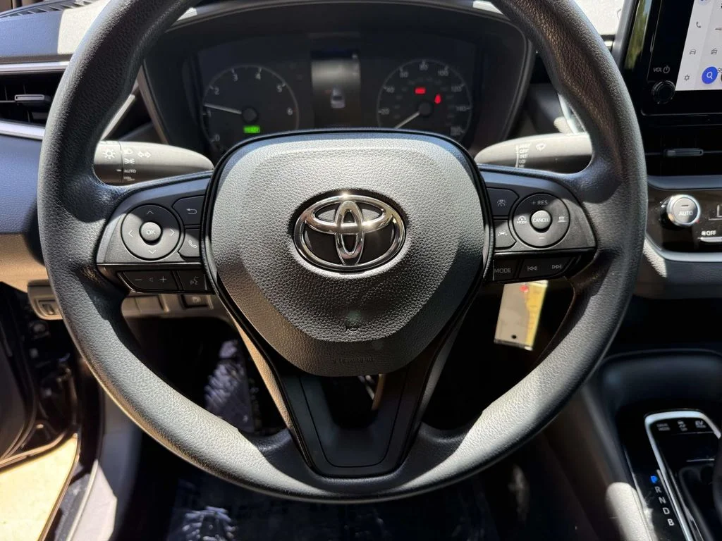 Used 2024 Black Toyota LE image 19