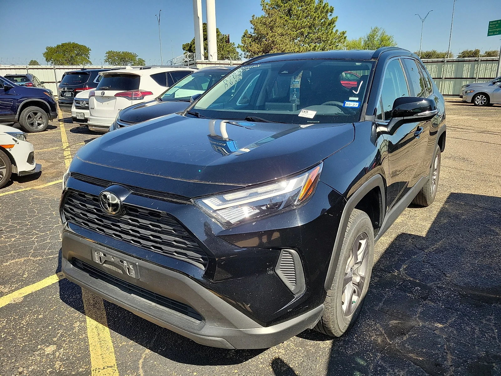 Certified Used 2025 Midnight Black Metallic Toyota XLE image 2