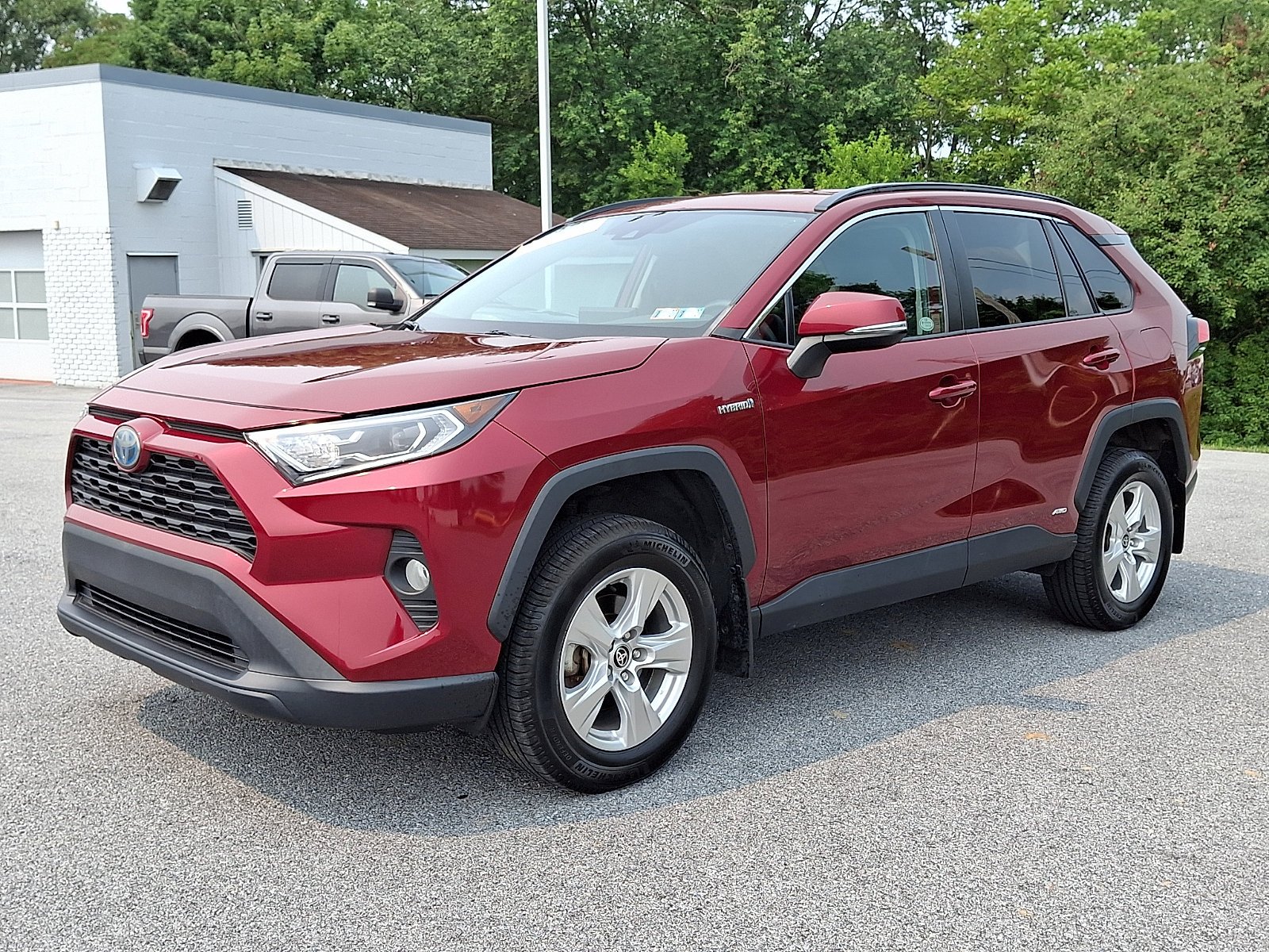 Used 2021 Ruby Flare Pearl Toyota Hybrid XLE image 3