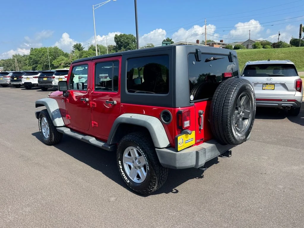 Used 2014 Red Jeep Unlimited Sport image 4