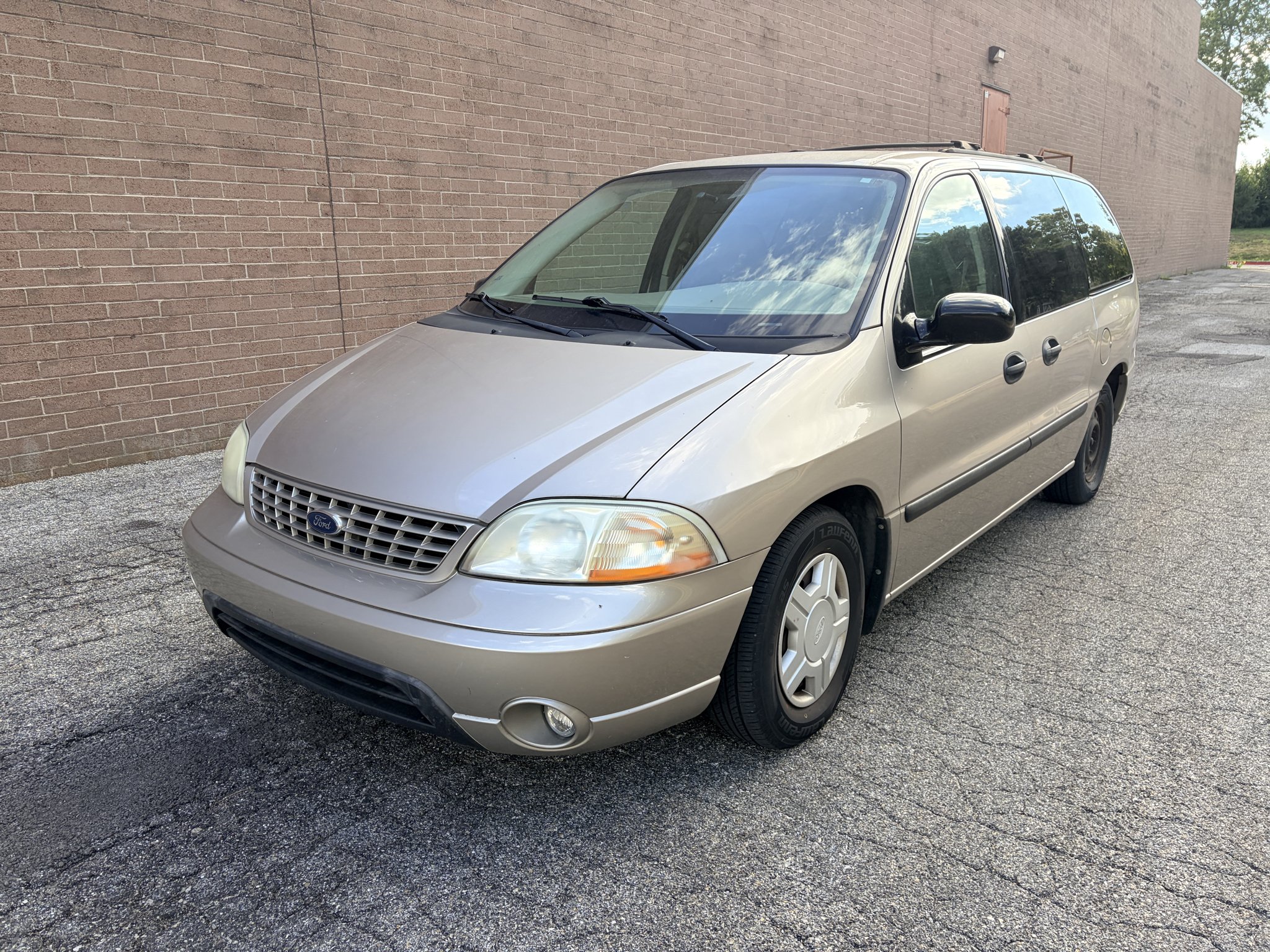 Used 2003 Silver Frost Clearcoat Metallic Ford LX image 1