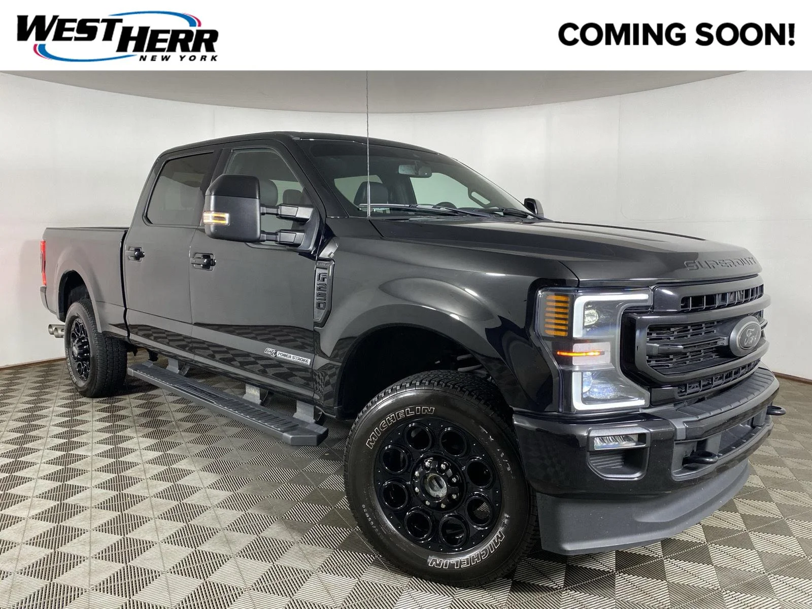 Used 2022 Agate Black Ford Lariat image 1