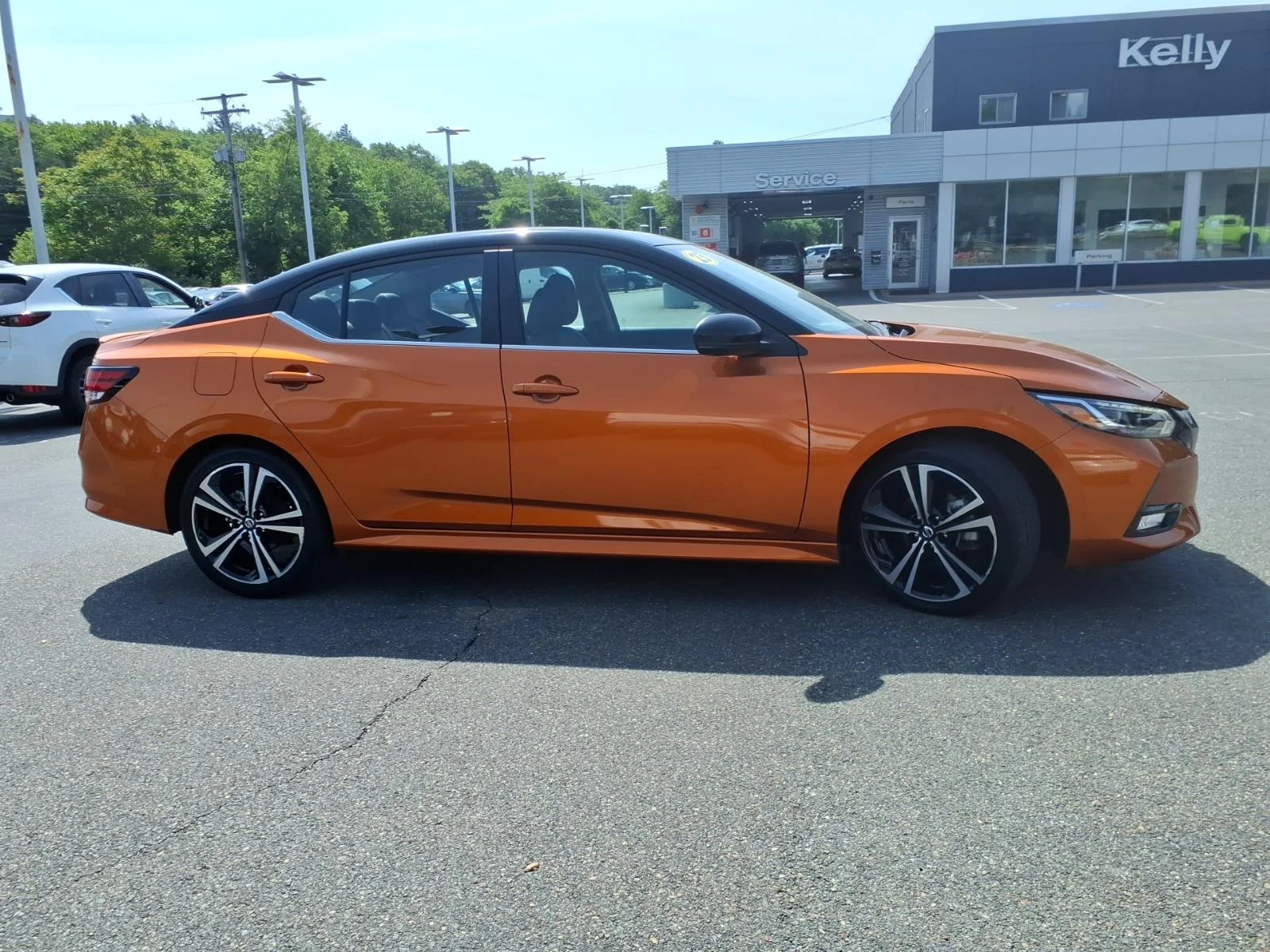 Certified Used 2023 Monarch Orange Metallic/Super Black Nissan SR image 4