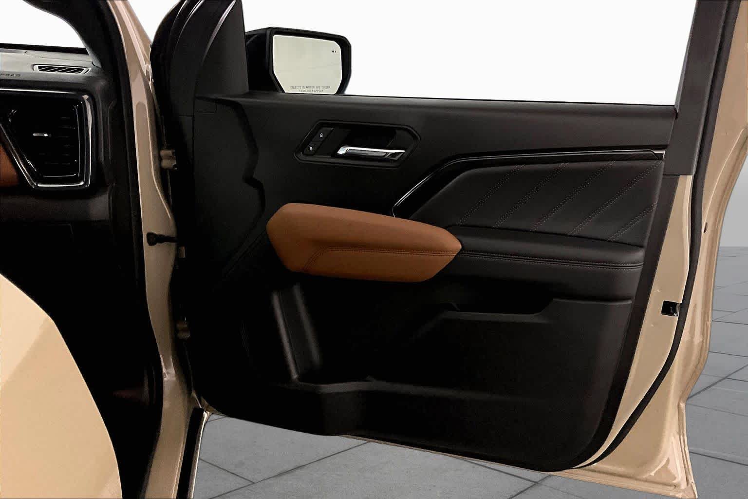 Used 2024 Desert Sand Metallic GMC 4WD AT4 image 19