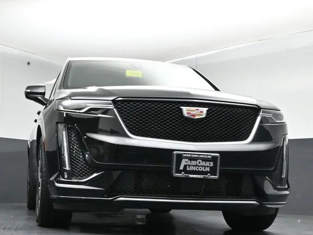 Certified Used 2025 Stellar Black Metallic Cadillac Sport image 38
