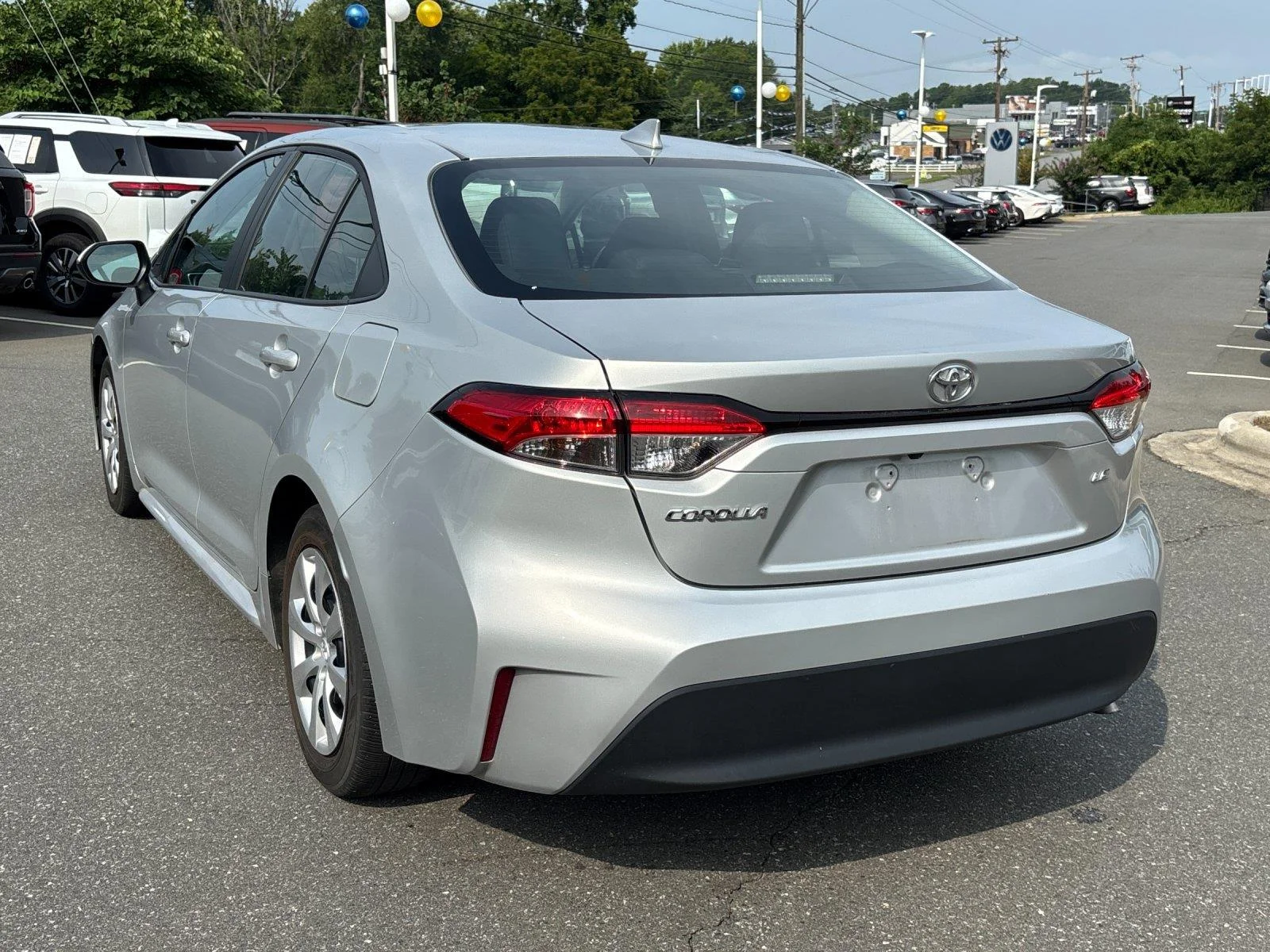 Used 2024 Classic Silver Metallic Toyota LE image 3