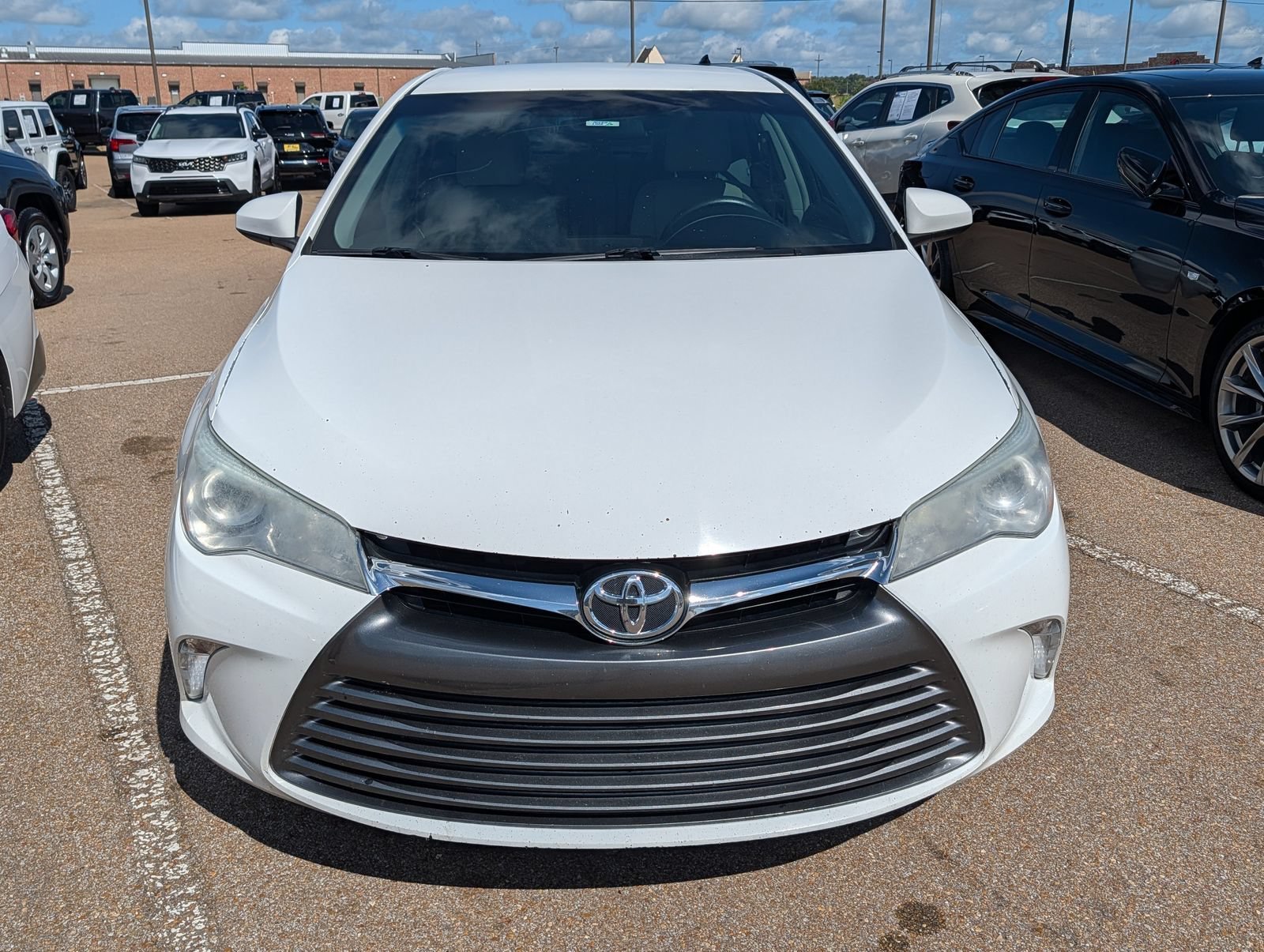 Used 2016 Toyota Camry LE with VIN 4T4BF1FK1GR571619 for sale in Madison, MS