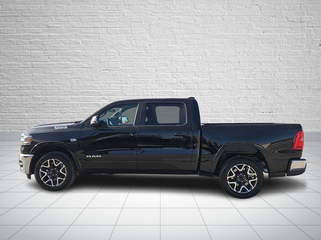 New 2026 Diamond Black Crystal Pearl-Coat Exterior Paint RAM Laramie image 2