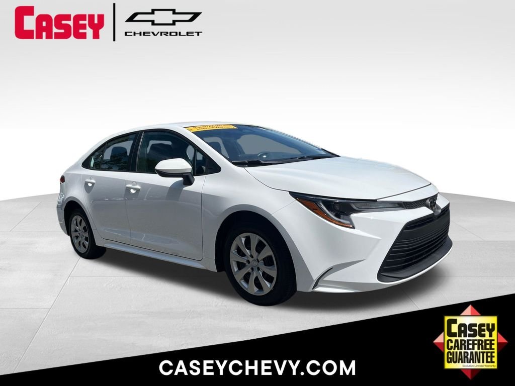Used 2025 White Toyota LE image 1