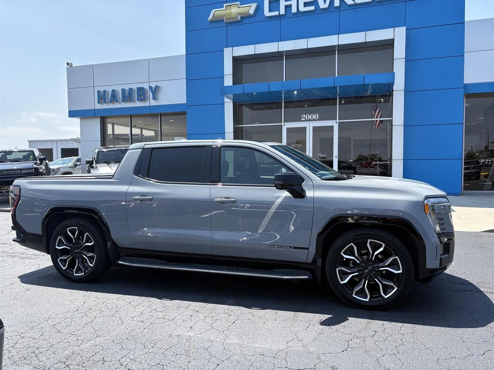 Used 2025 Thunderstorm Gray GMC Max Range Denali image 2