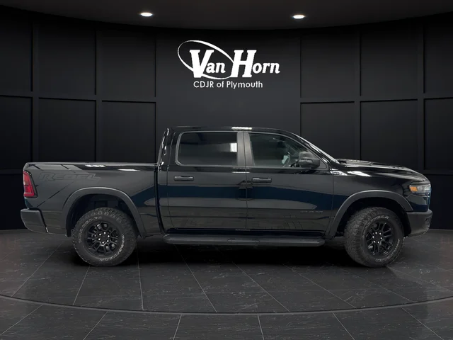 Used 2025 Diamond Black Ram Rebel image 8