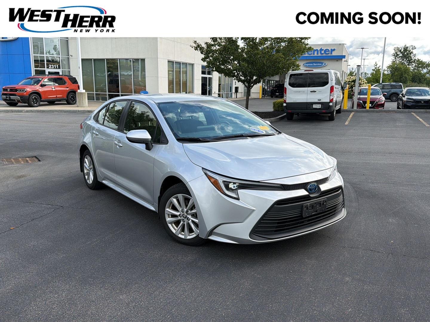 Used 2024 Classic Silver Metallic Toyota Hybrid LE image 1