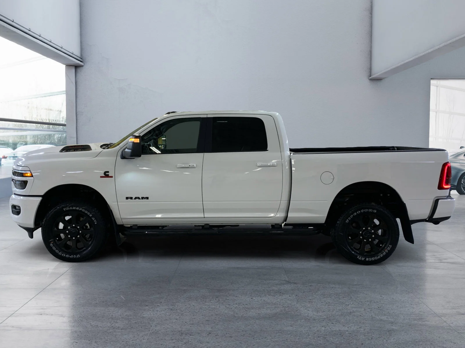 New 2026 Bright White Ram Laramie image 2