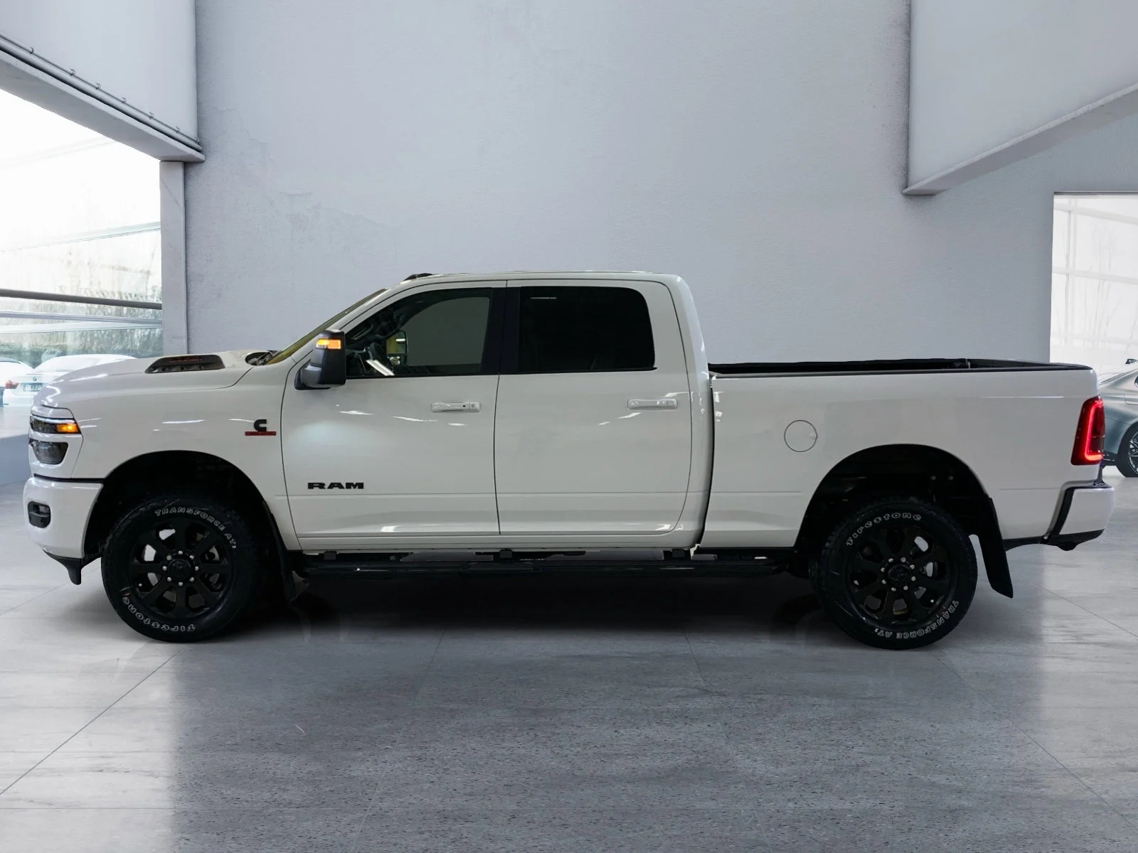 New 2026 Bright White Ram Laramie image 2