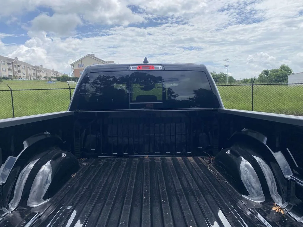 New 2026 Diamond Black Crystal Pearl-Coat Exterior Paint RAM Laramie image 8