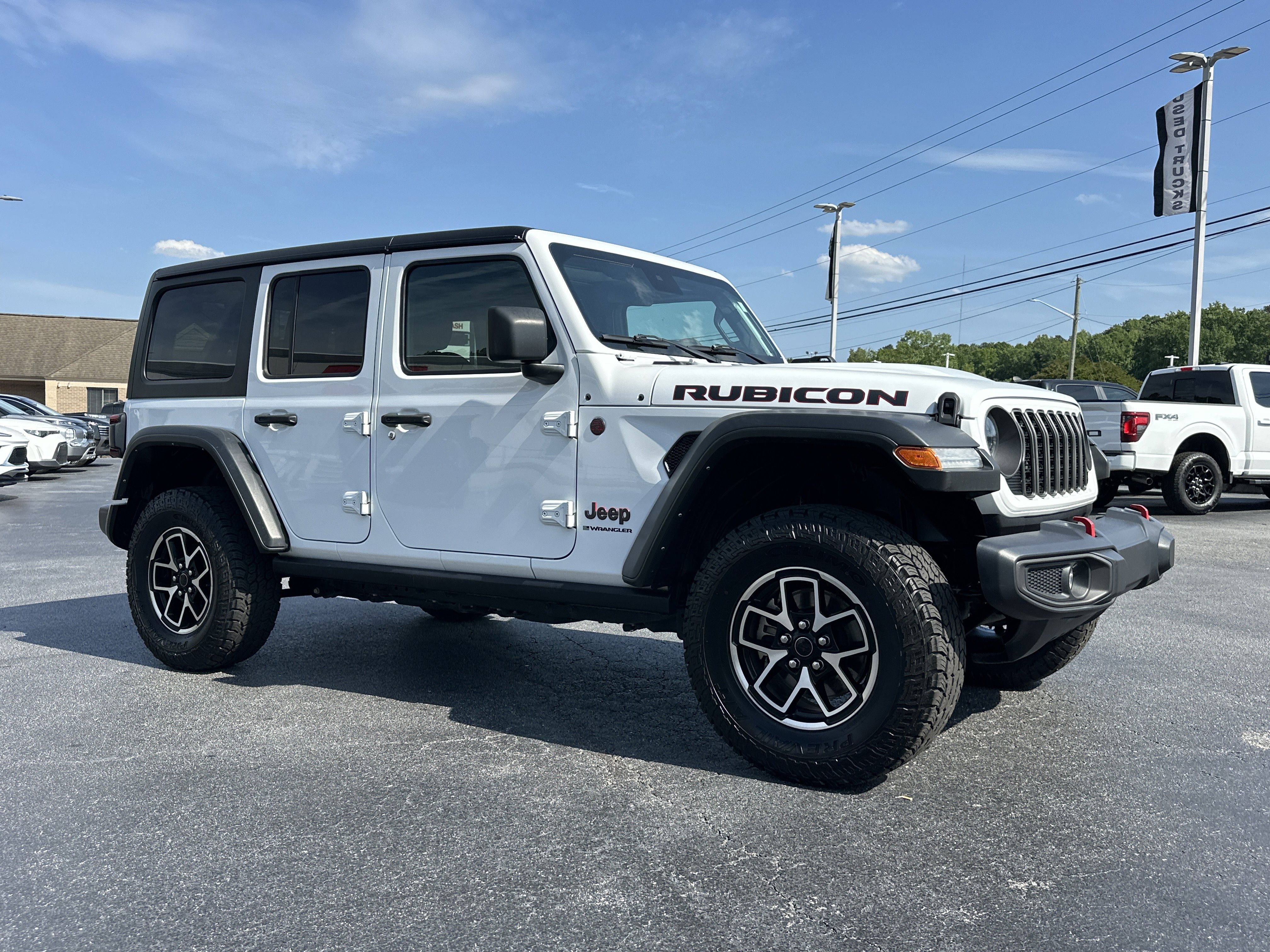Used 2024 Bright White Clearcoat Jeep Rubicon image 2