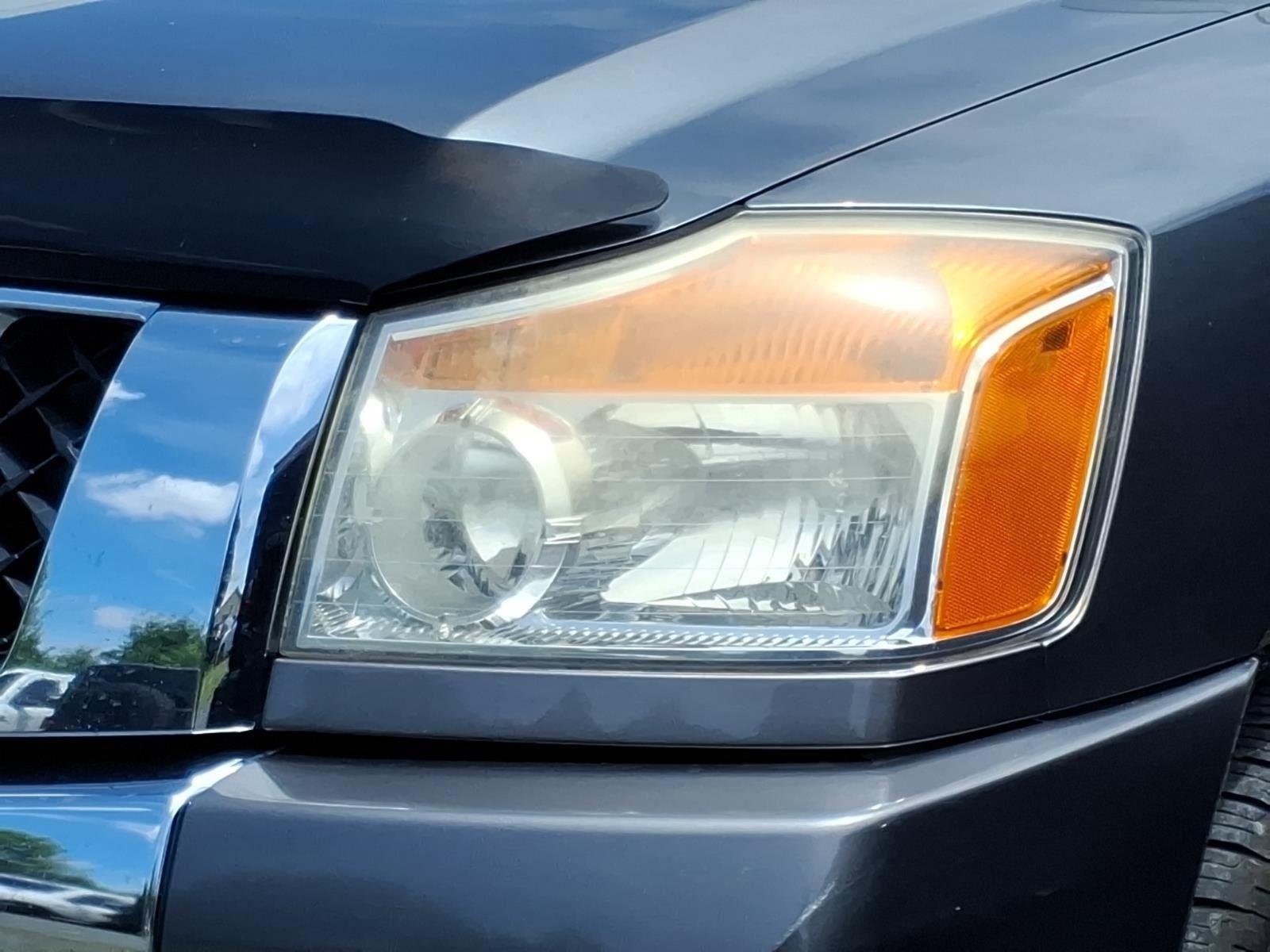 Used 2014 Gun Metallic Nissan SV image 1