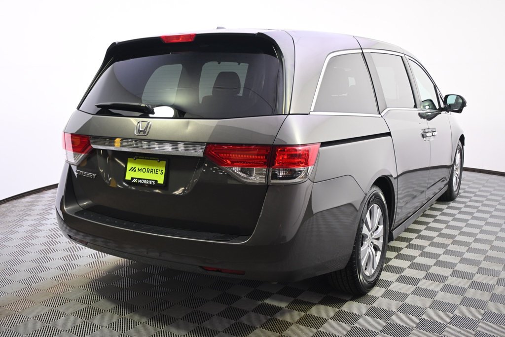 Used 2014 Honda Odyssey EX-L with VIN 5FNRL5H68EB111991 for sale in St. Louis Park, MN