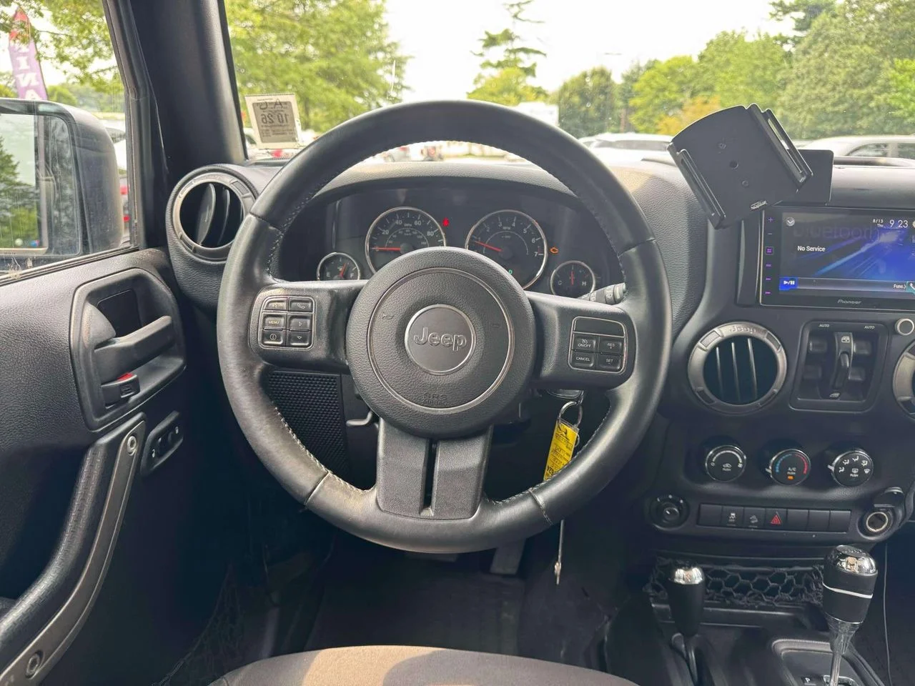 Used 2015 Black Clearcoat Jeep Sport image 23