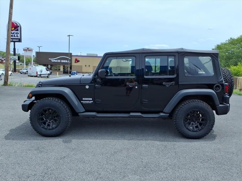 Used 2013 Jeep Wrangler Unlimited Sport with VIN 1C4BJWDG1DL678616 for sale in Pounding Mill, VA