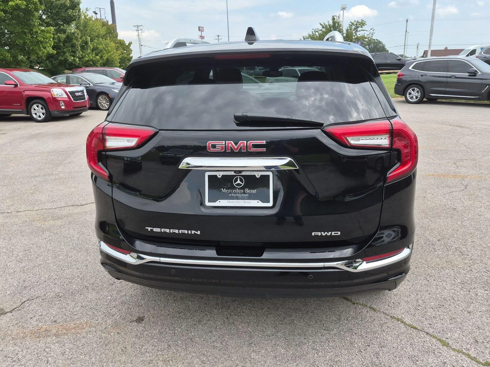 Used 2023 Ebony Twilight Metallic GMC Denali image 4