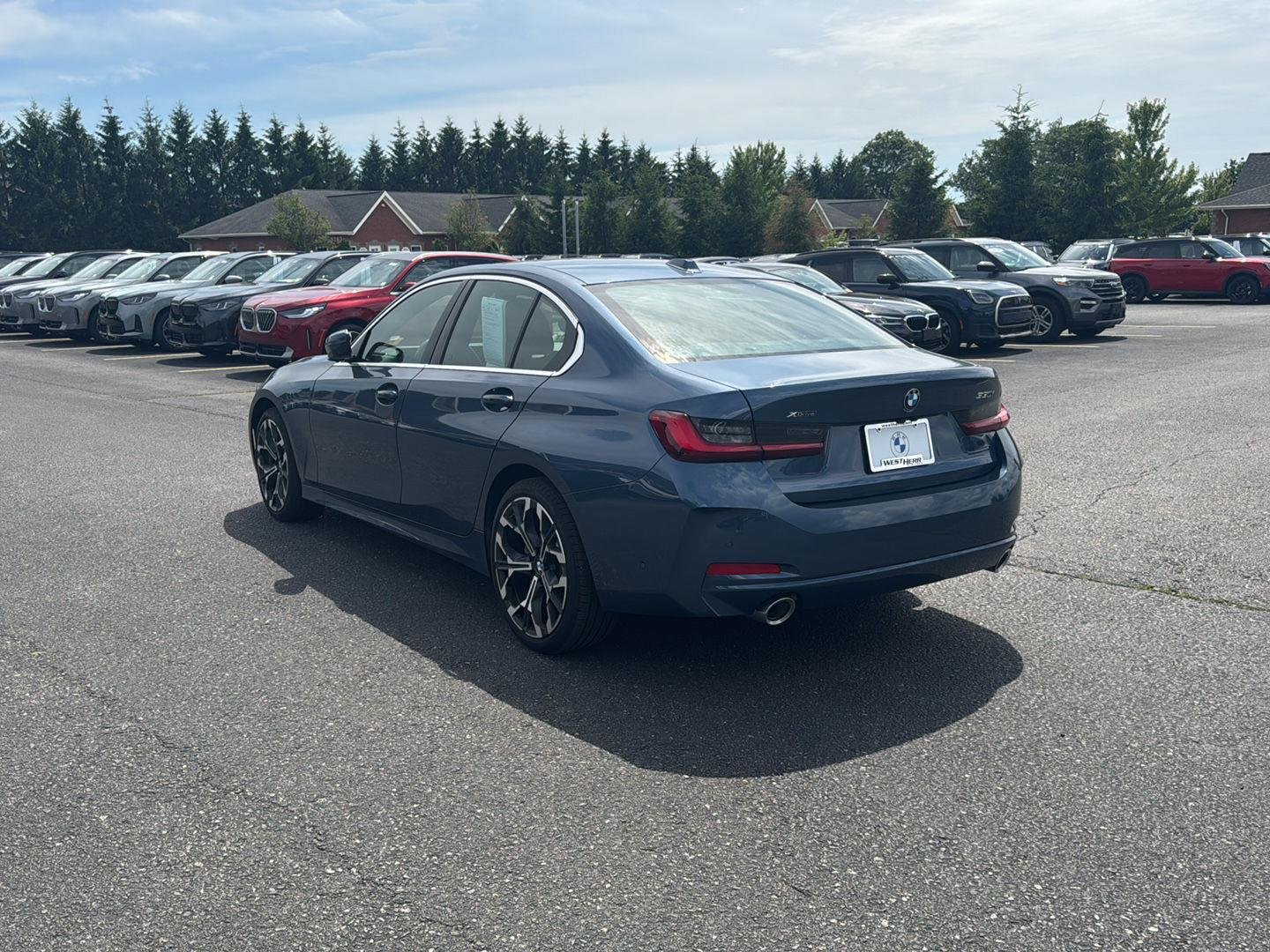 Used 2025 Arctic Race Blue Metallic BMW 330i xDrive image 5